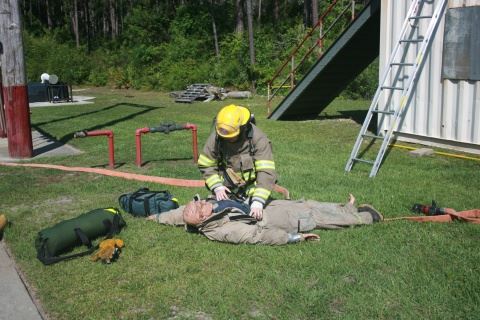 Firefighters Practicing Rescue Exercises