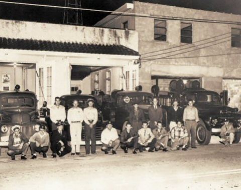 Group of Firefighters with Cars