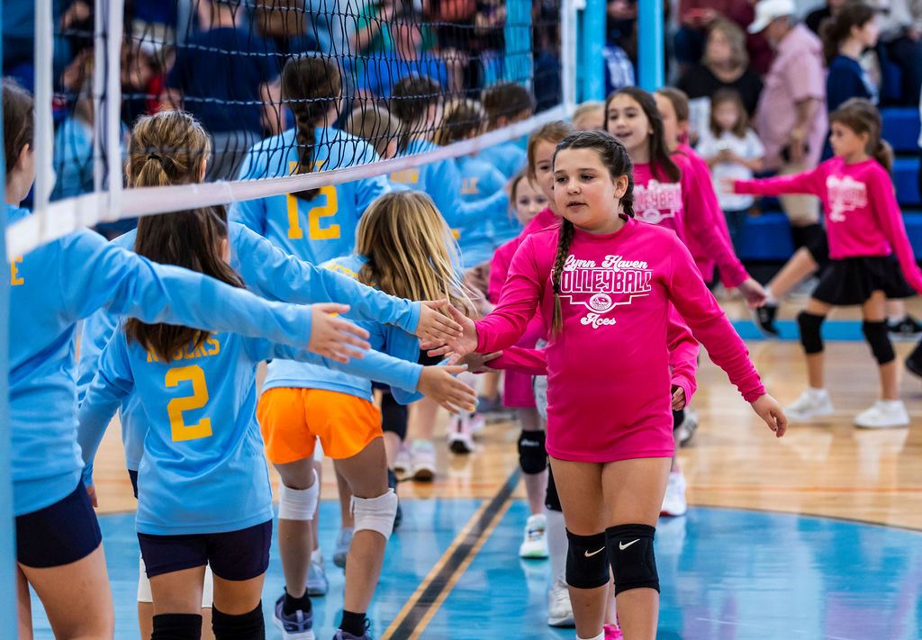 091_020825_LynnHavenflagfbandvolleyball