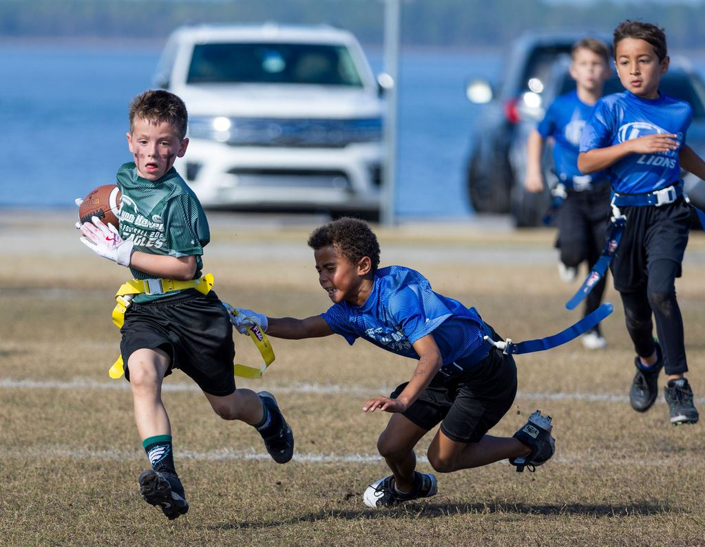 041_020825_LynnHavenflagfbandvolleyball